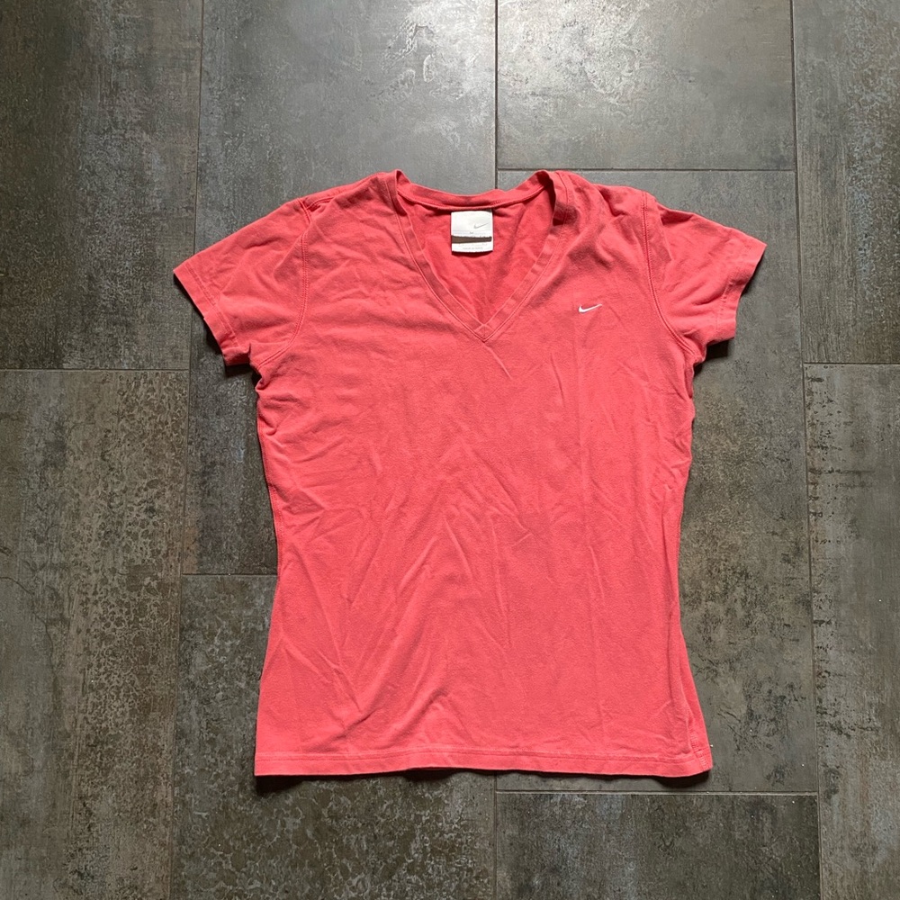 Nike women’s vintage coral athletic v-neck t-shirt. Size medium.